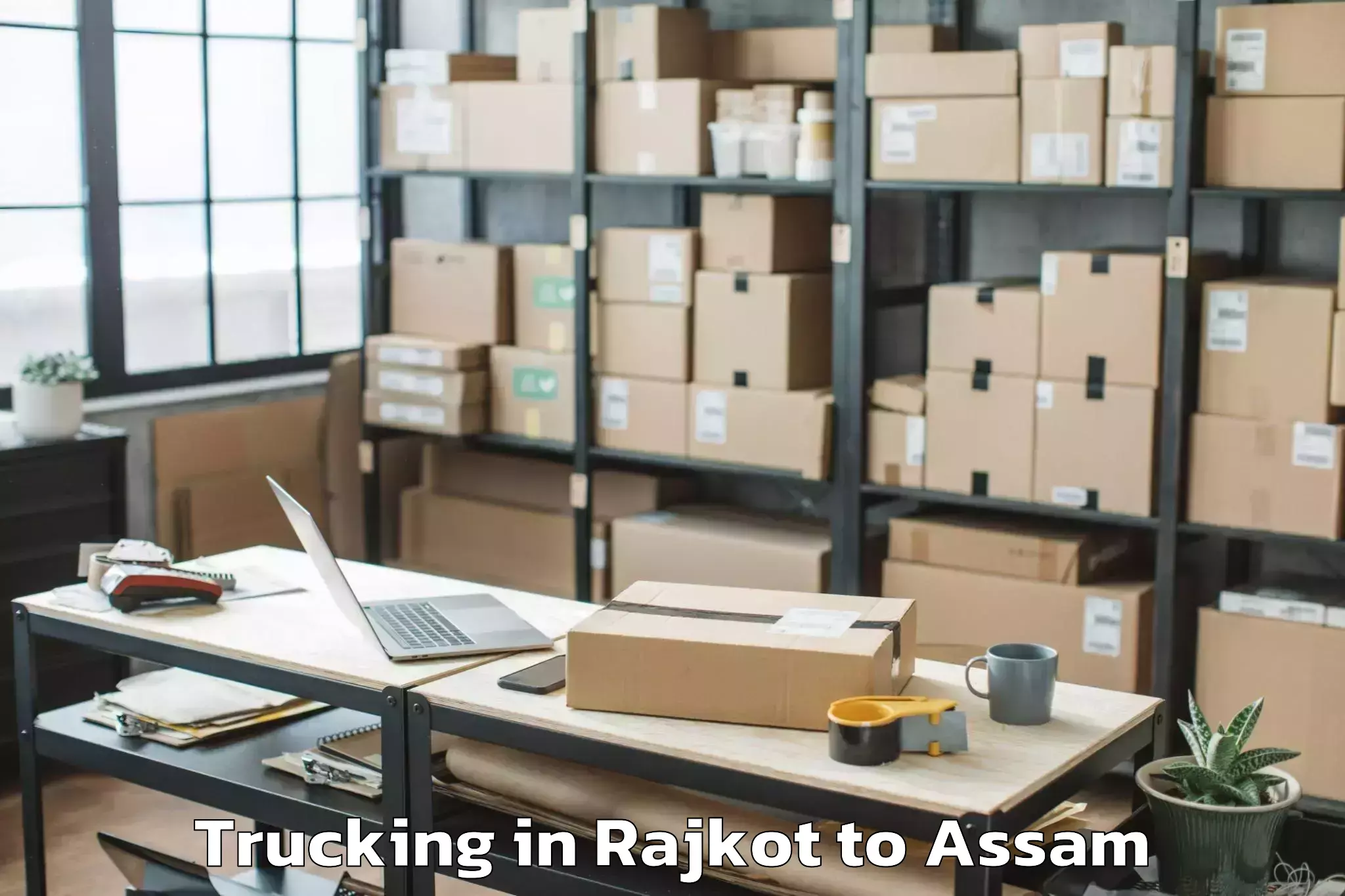 Book Rajkot to Dhuburi Trucking Online